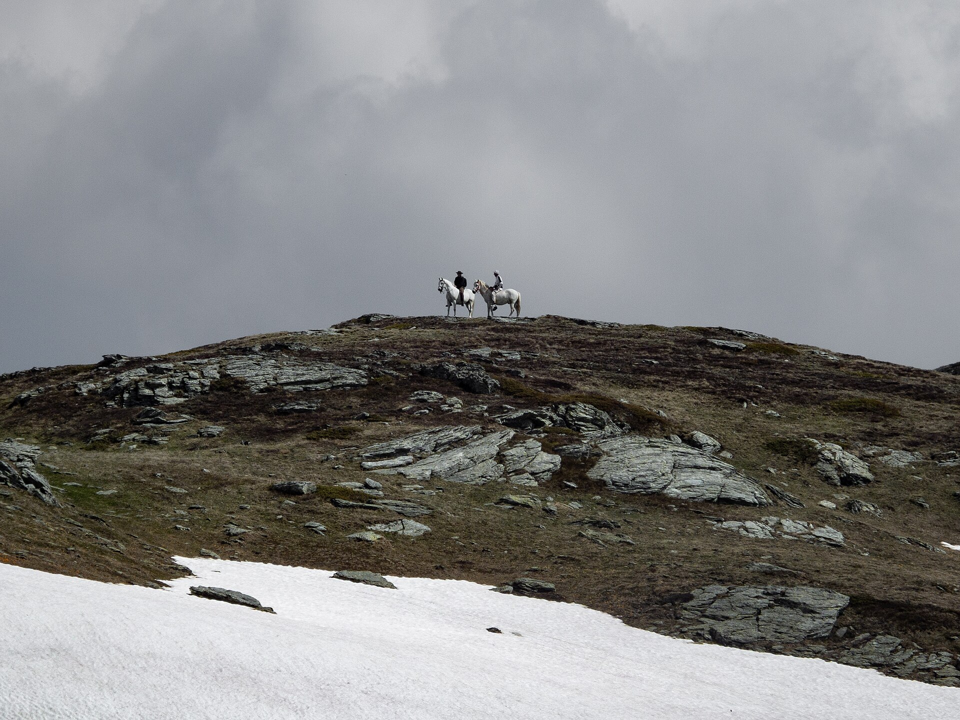 Horseback rider on scenic mountain trail